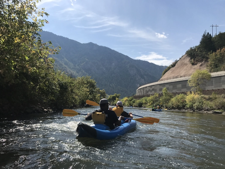 Students from Telos Academy rafting down a river in Utah